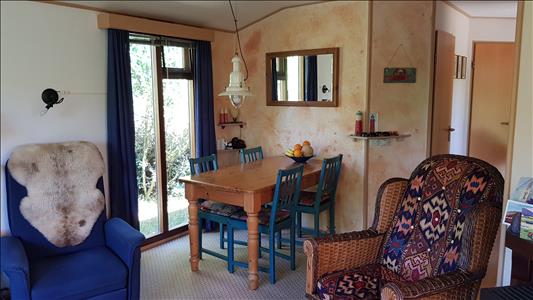 Vanaf € 320,-. Texel - Luxe Chalet (2 volwassenen, 2 kinderen) op schitterende locatie vlak bij bos en strand - "Ta Lème"