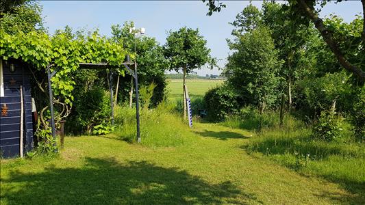 Vanaf € 320,-. Texel - Luxe Chalet (2 volwassenen, 2 kinderen) op schitterende locatie vlak bij bos en strand - "Ta Lème"